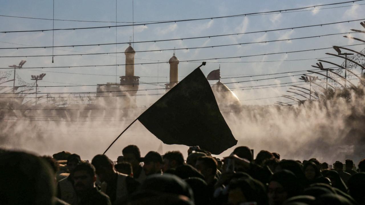 In Photo: Shiite Muslim devotees attend a ritual near the shrine of Imam Hussein in Iraq's holy city of Karbala during Ashura