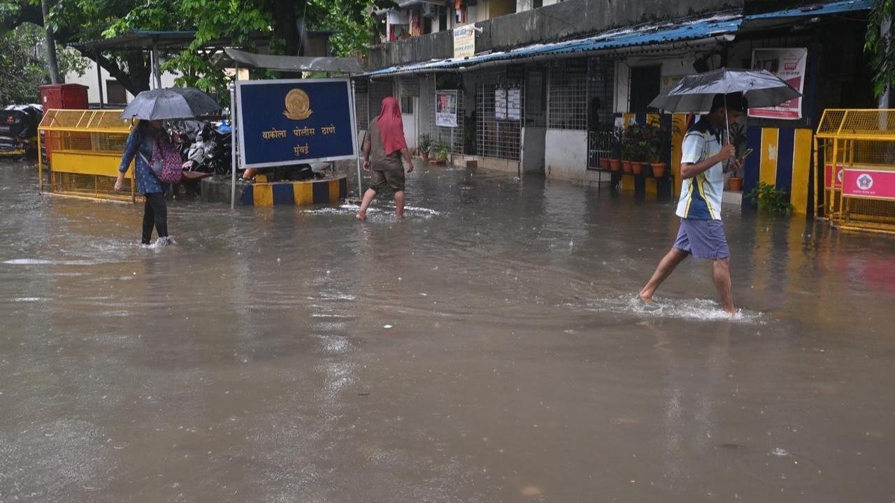 IN PHOTOS: Waterlogging, traffic snarls in Vakola as city witnesses heavy rains