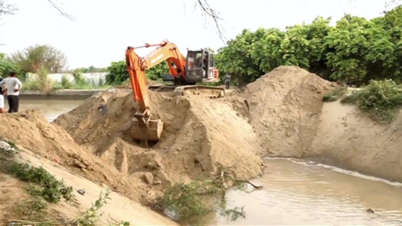 Repair work on the Munak Canal in North Delhi continued on Friday after a breach in the canal caused severe flooding in the Bawana JJ Colony.