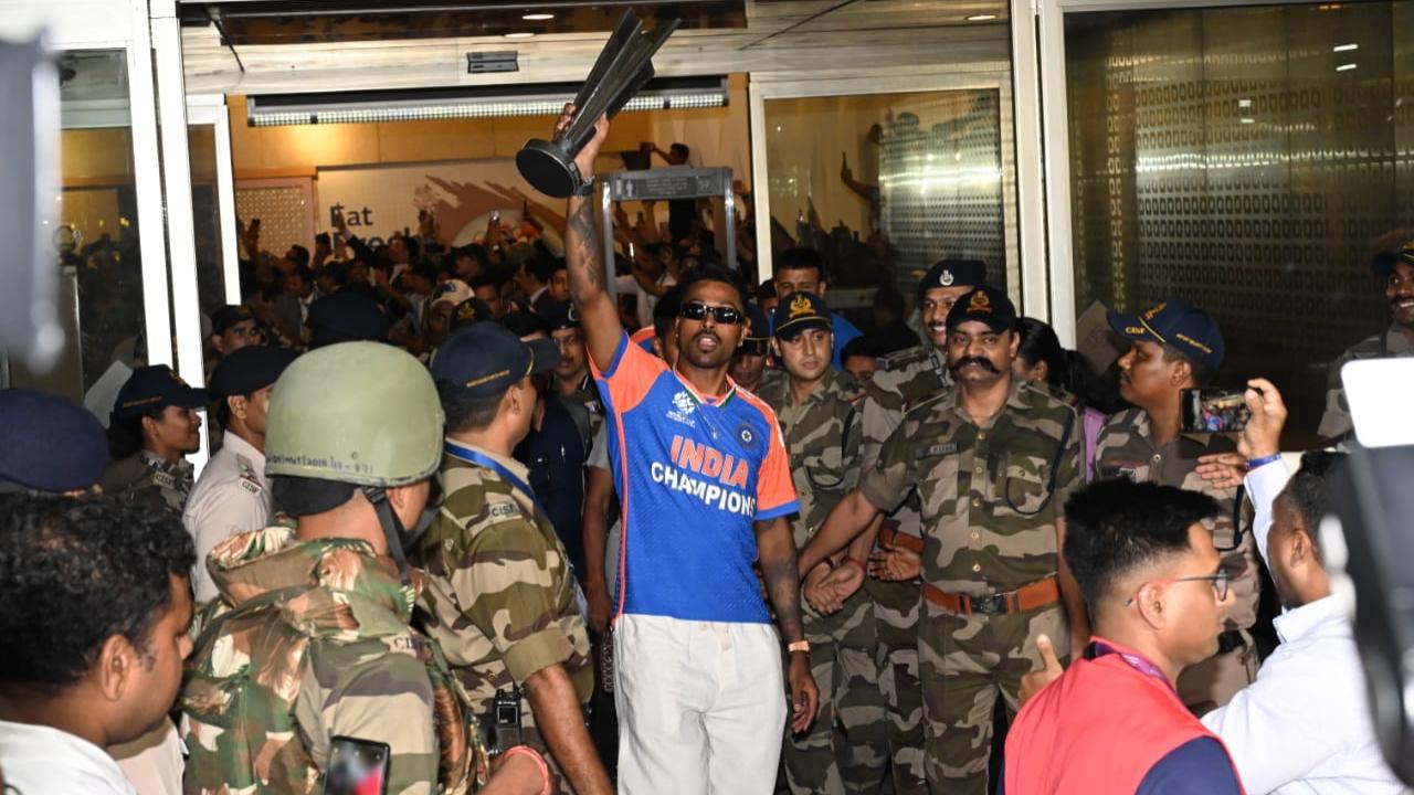 Hardik Pandya spotted holding aloft the World Cup trophy with pride as he steps outside Mumbai airport