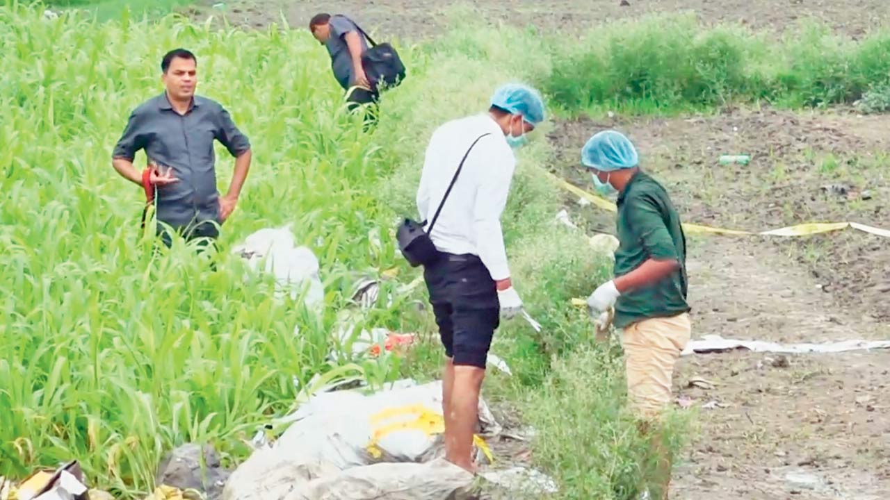 A forensic team investigates the scene. Pic/PTI