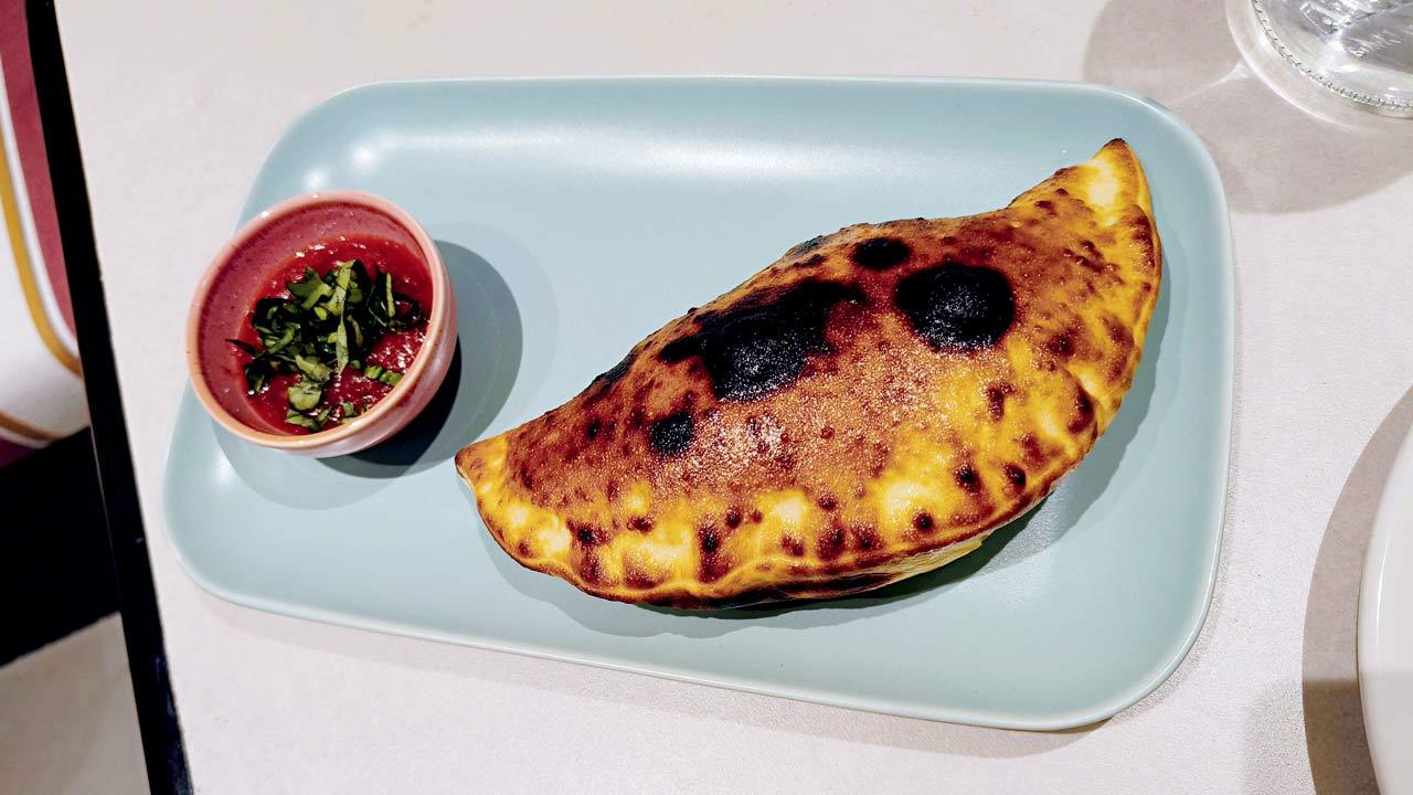 Calzone caponata is a balanced mix of cheese and vegetables