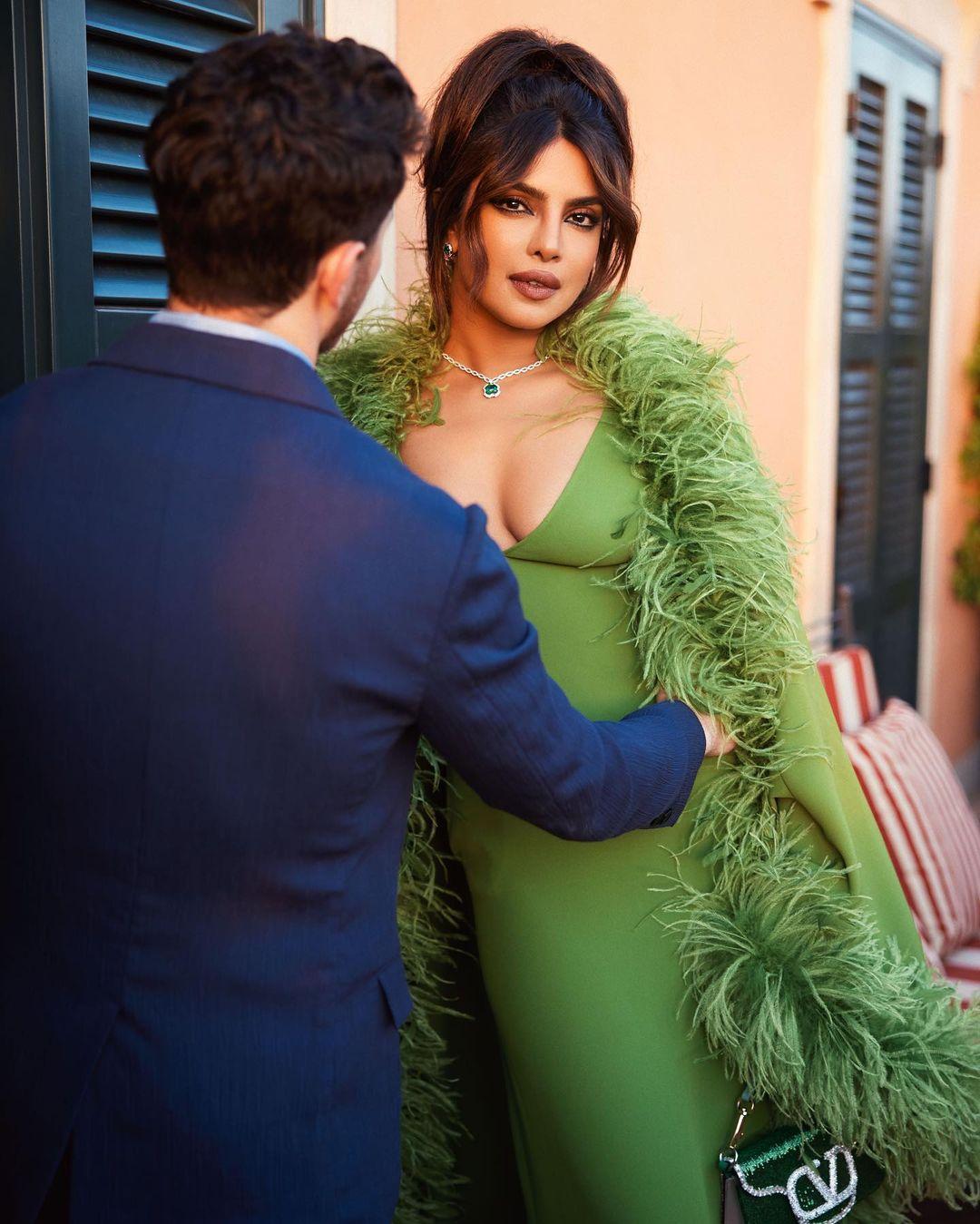 Her brunette hair was styled in a high ponytail with loose strands by her hairstylist Thibaud Salducci. 