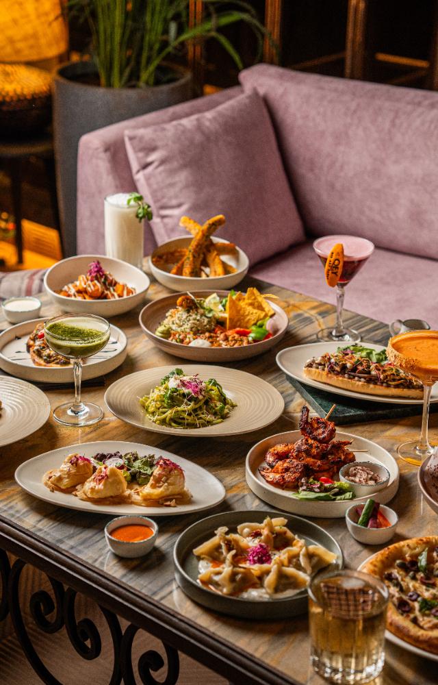 At QEY, Lower Parel, dive into caprese burrata delight, the qeysar, iskender kebab, calamari fritti, orecchiette bolognese, mediterranean pot pie and more
