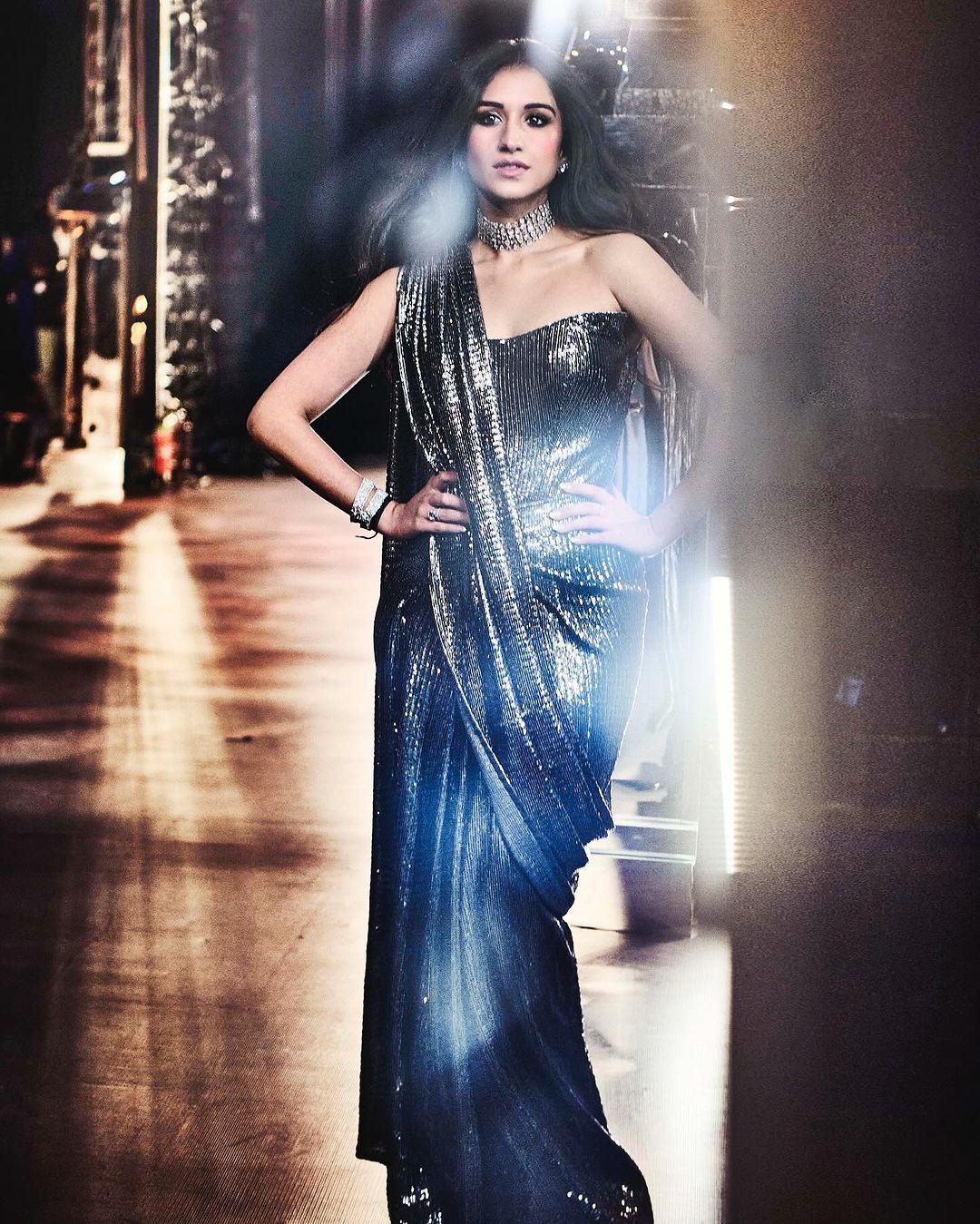 Radhika Merchant looked amazing in a custom Manish Malhotra outfit for the after party, wearing a gunmetal saree. This unique saree was made of metal plates connected by metal rings. 