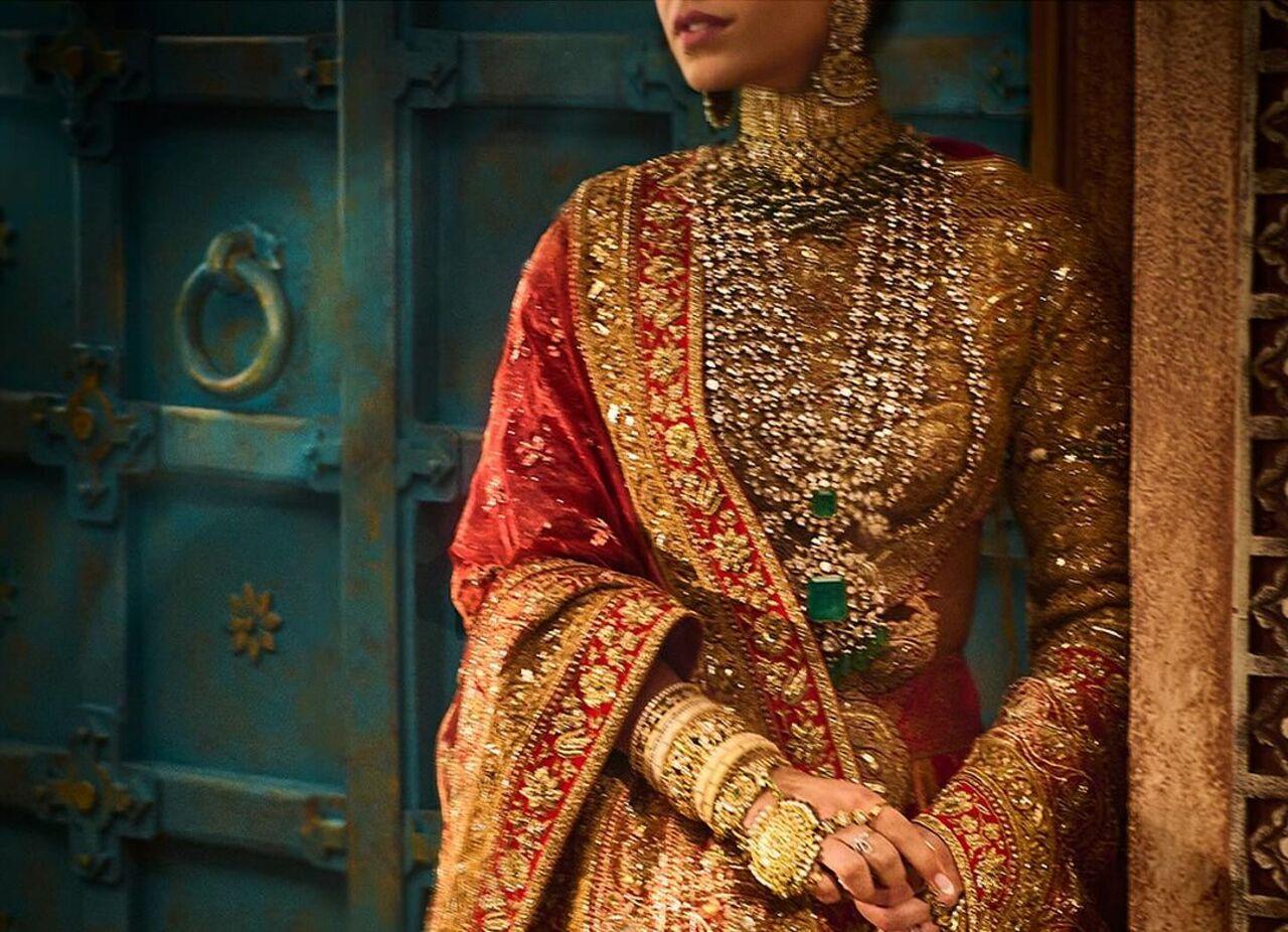 Styled by Rhea Kapoor, Radhika's vidai look featured a bespoke couture lehenga adorned with intricate details and rich textiles