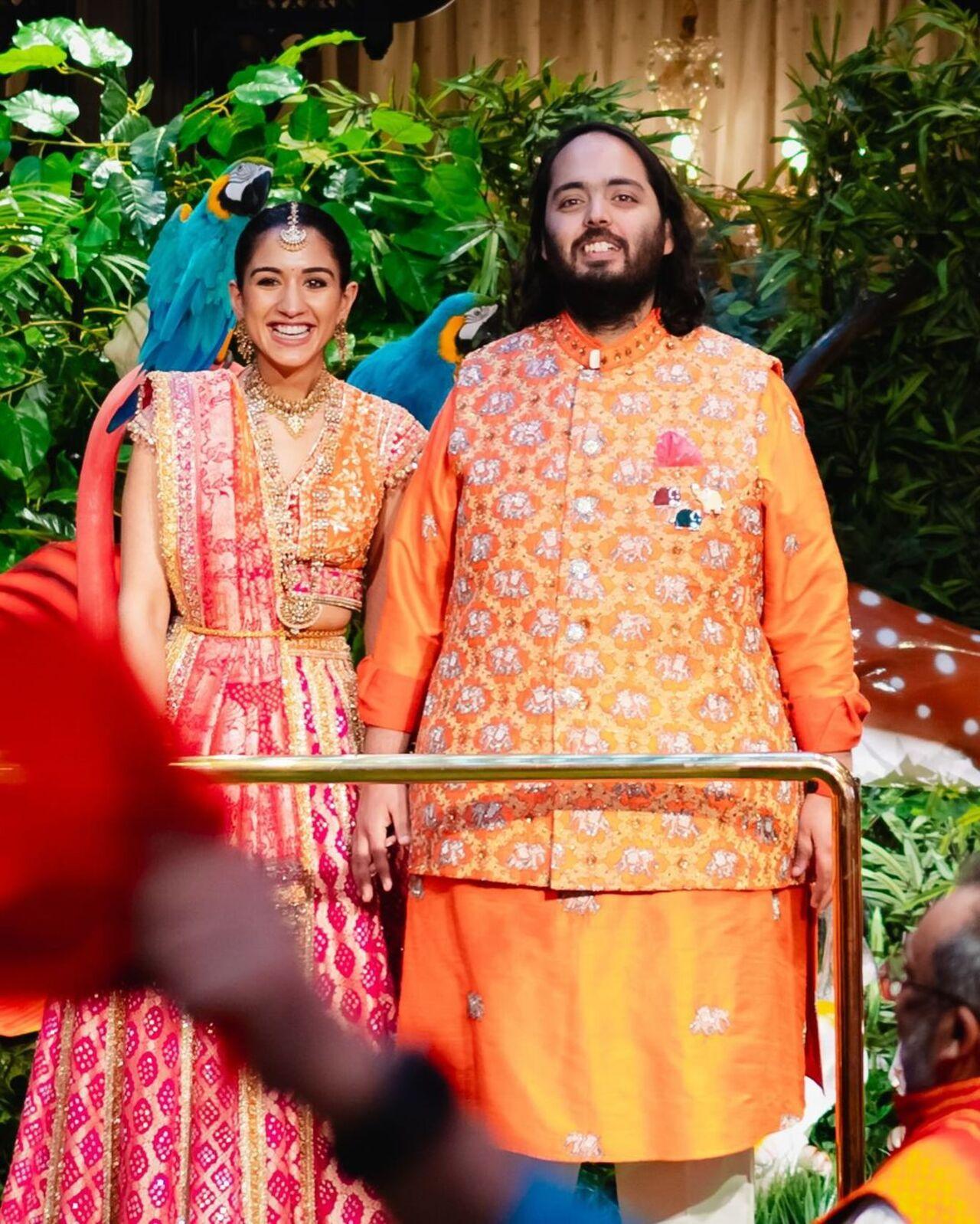 Radhika Merchant and Anant Ambani are all smiles as they get clicked for their mameru ceremony. They sported custom Raghavendra Rathore outfits