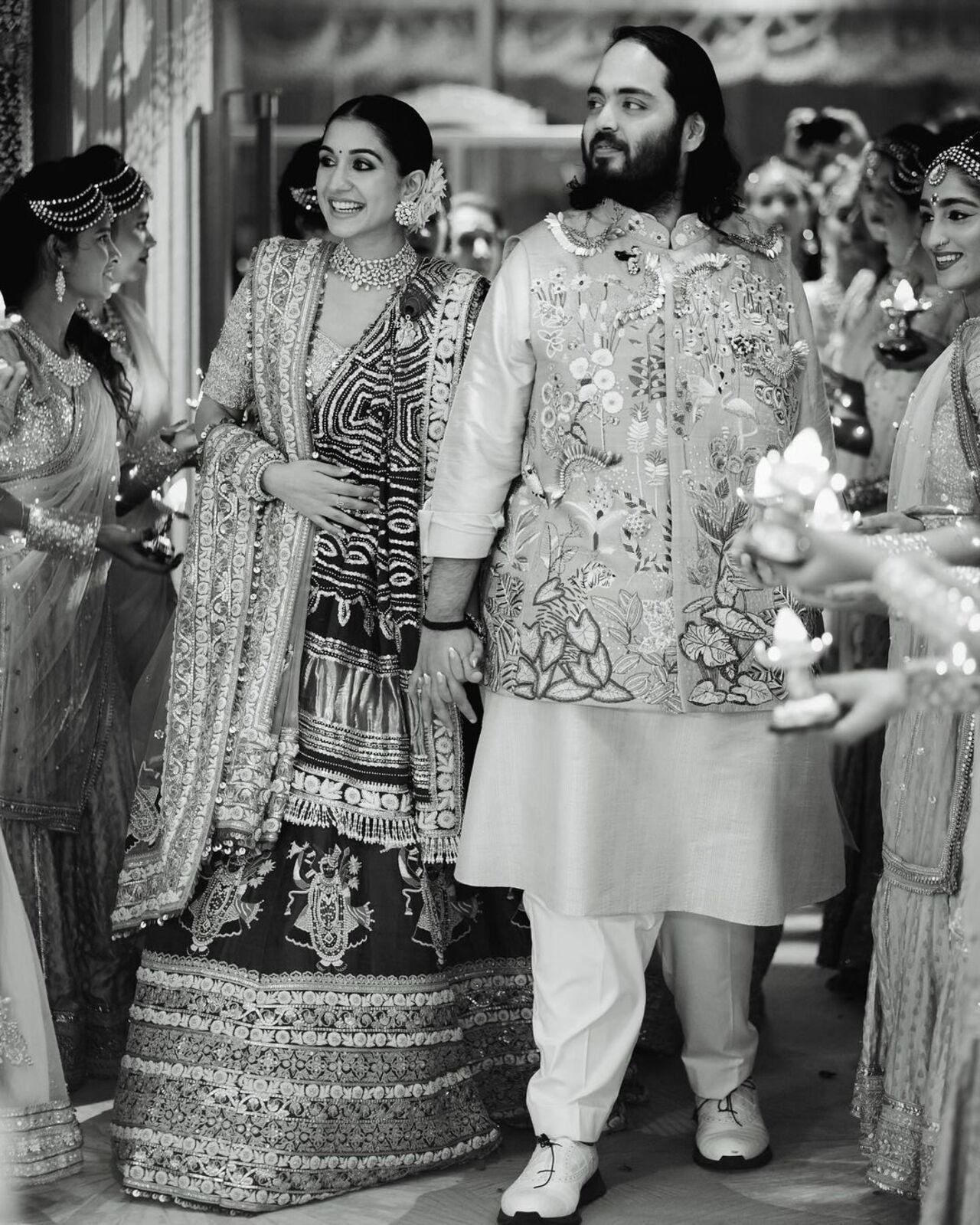 Anant and Radhika caught in a candid moment surrounded by their loved ones