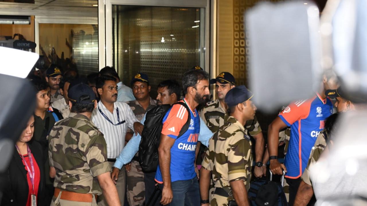 Batting coach Vikram Rathour steps outside the airport as Team India prepare for Victory Parade