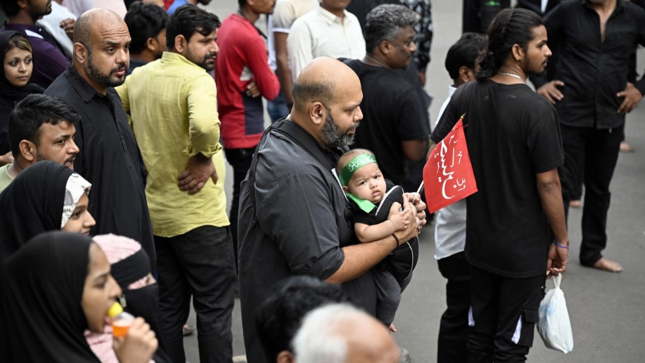 Shiite Muslims take part in 'tatbir,' a form of self flagelaltion, to mark Ashura on the tenth day of the Islamic month of Muharram