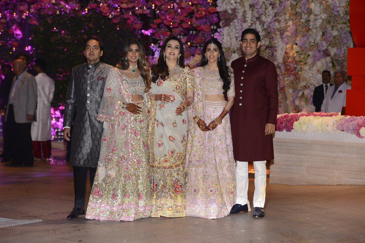 For their engagement, Akash chose a shade of maroon, while Shloka donned a pink Abu Jan-Sandeep Khosla ensemble for the occasion.