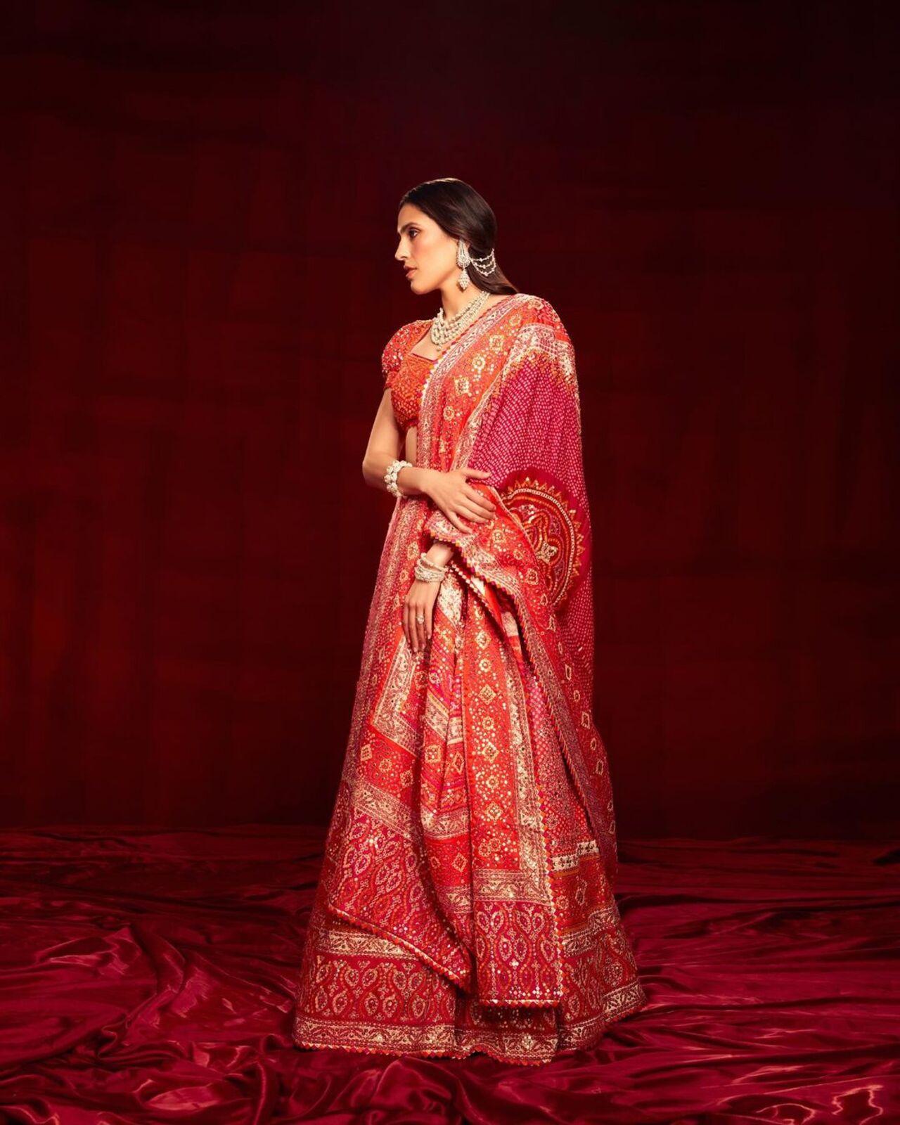 For the Mameru ceremony, Shloka Ambani wore a custom lehenga by Abu Jani and Sandeep Khosla. 