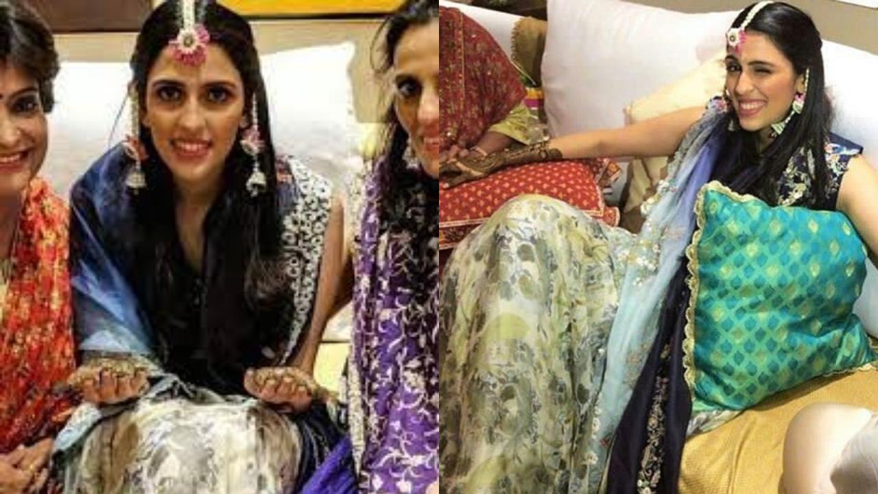 For her mehendi ceremony, Shloka opted for a traditional navy blue and cream lehenga laced with heavy embroidery. 
