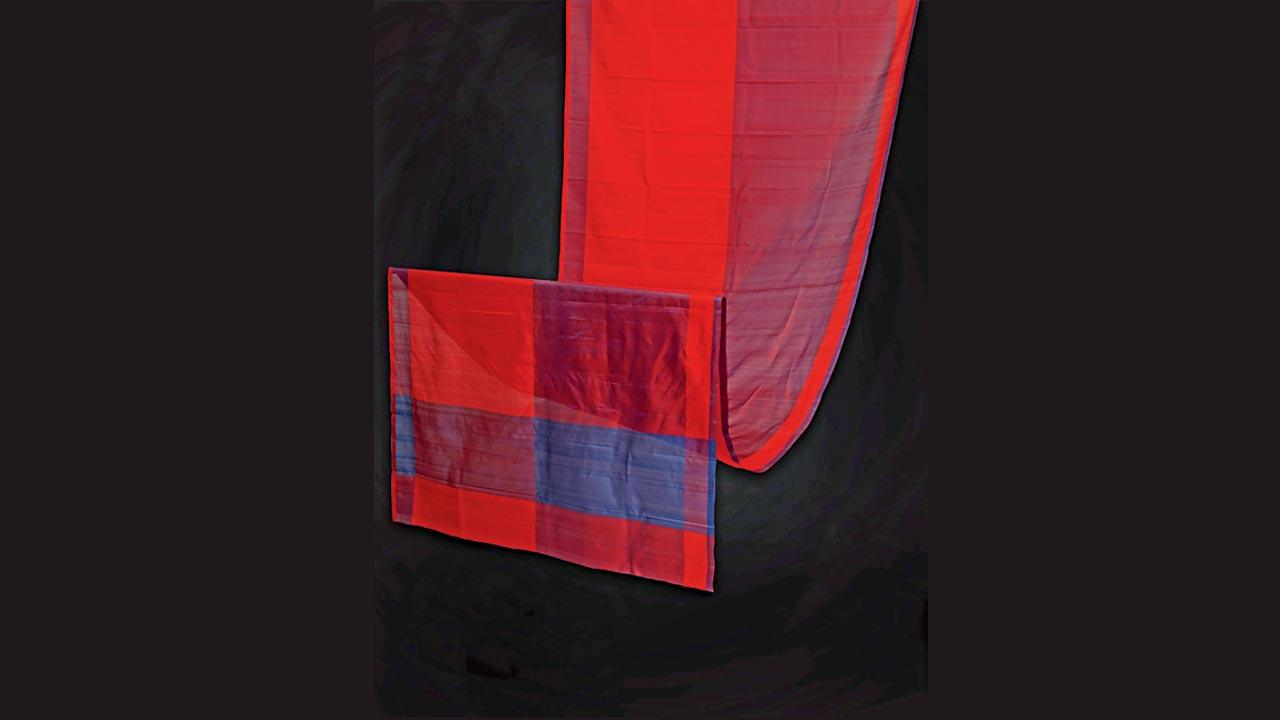 Half blue, half red wave saree in handwoven mulberry silk, inspired by Josef Albers’ Interaction of Colour theory, from Kodiyala weaving cluster