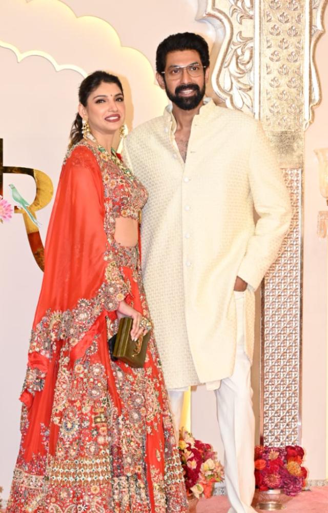 Baahubali star Rana Daggubati arrived in a simple white kurta while his wife Miheeka Bajaj looked stunning in a coral lehenga. 