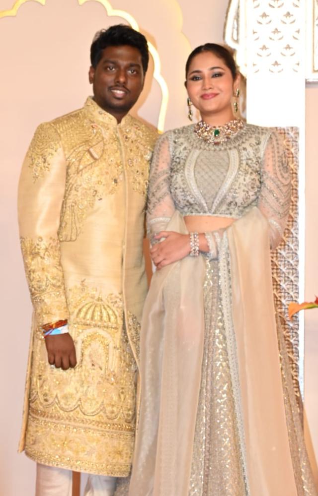 Jawan director Atlee and his wife who were a part of the baraatis exuded regal vibes in golden and silver ensembles. 