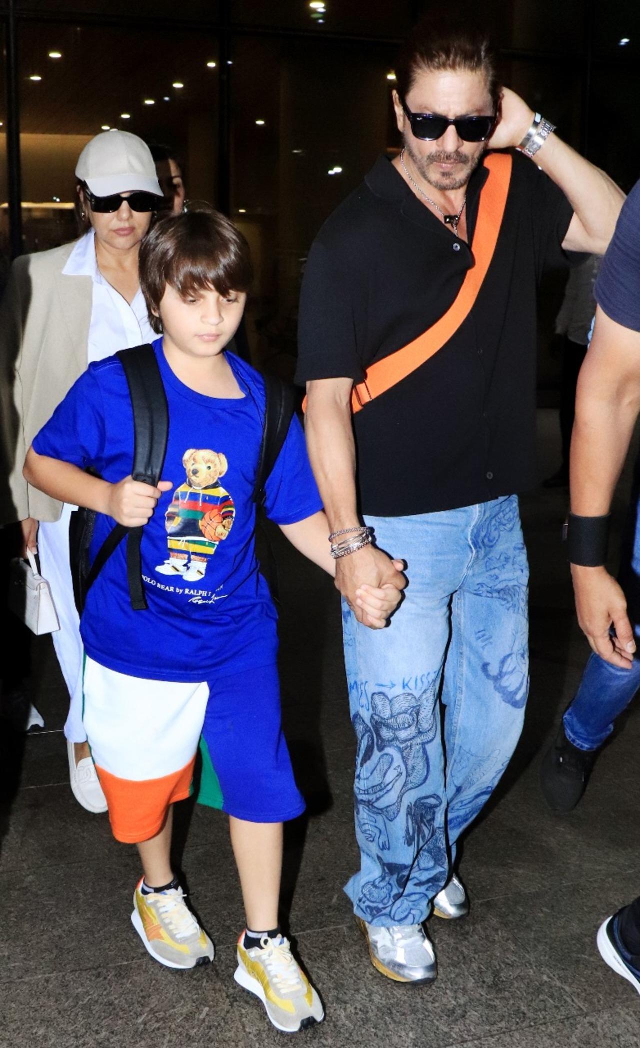 Shah Rukh Khan with wife Gauri and their son AbRam was seen arriving back to Mumbai on Thursday morning