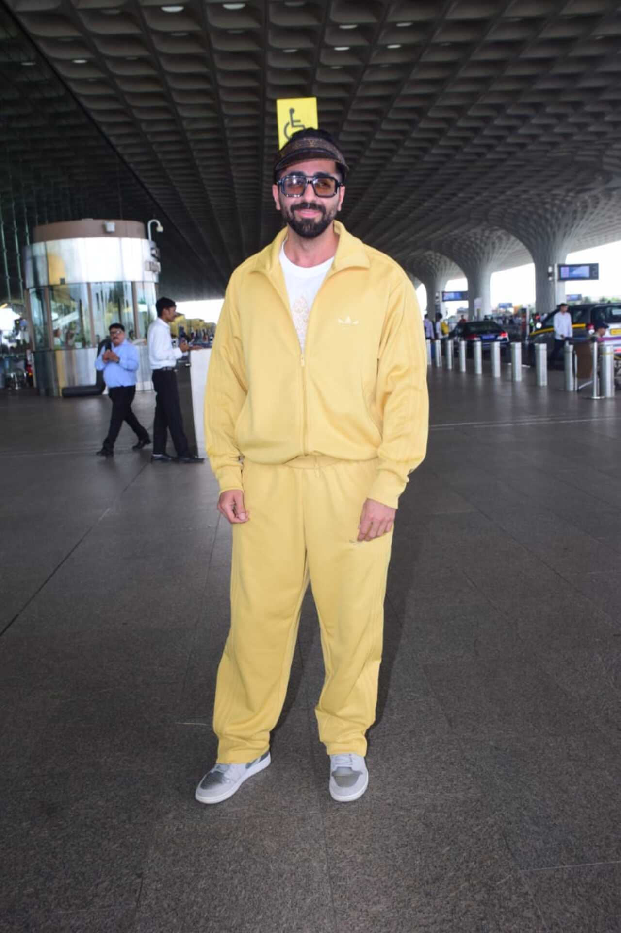Ayushmann Khurrana dressed in a yellow track suit was spotted at the Mumbai airport