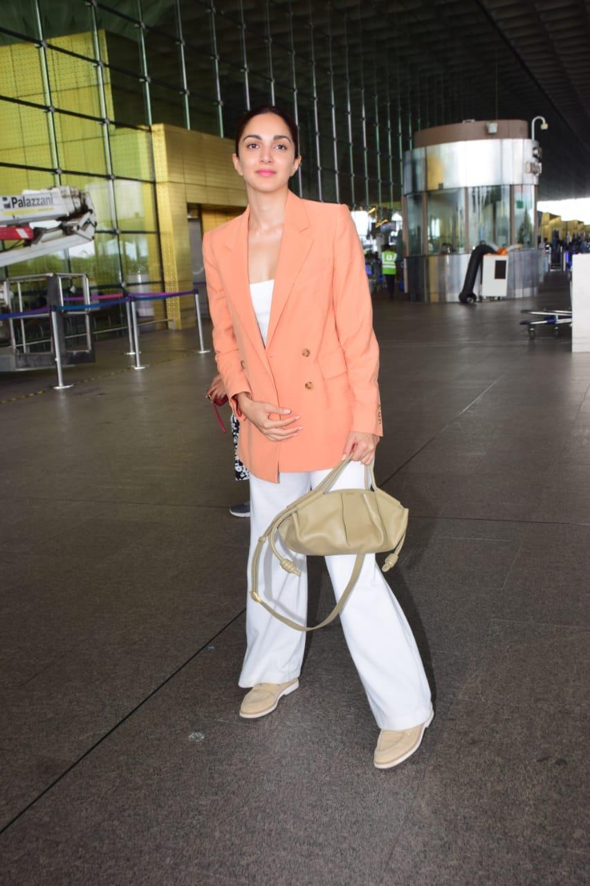 The actress opted for an all-white ensemble which she paired with an orange blazer 