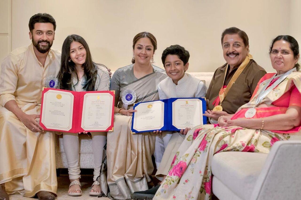 Suriya with his wife Jyotika, their kids and his parents