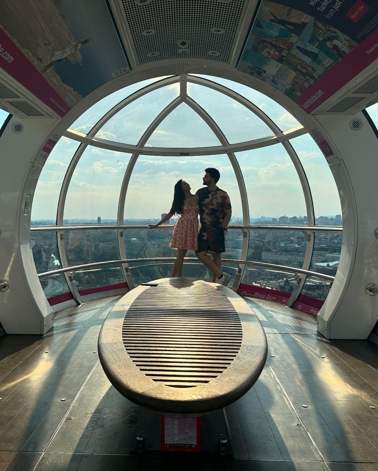 Tejasswi Prakash and Karan Kundrra's first photo dump from their London vacation featured the actress dressed in a pink dress while the actor was in a T-shirt and shorts