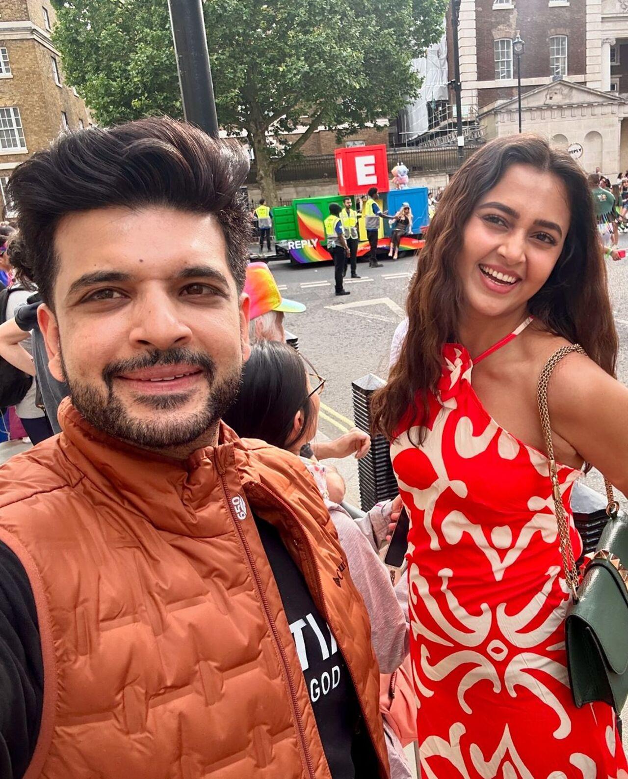 In these pictures, Karan is seen wearing a brown jacket with a black T-shirt while Tejasswi complemented him in a beautiful red dress