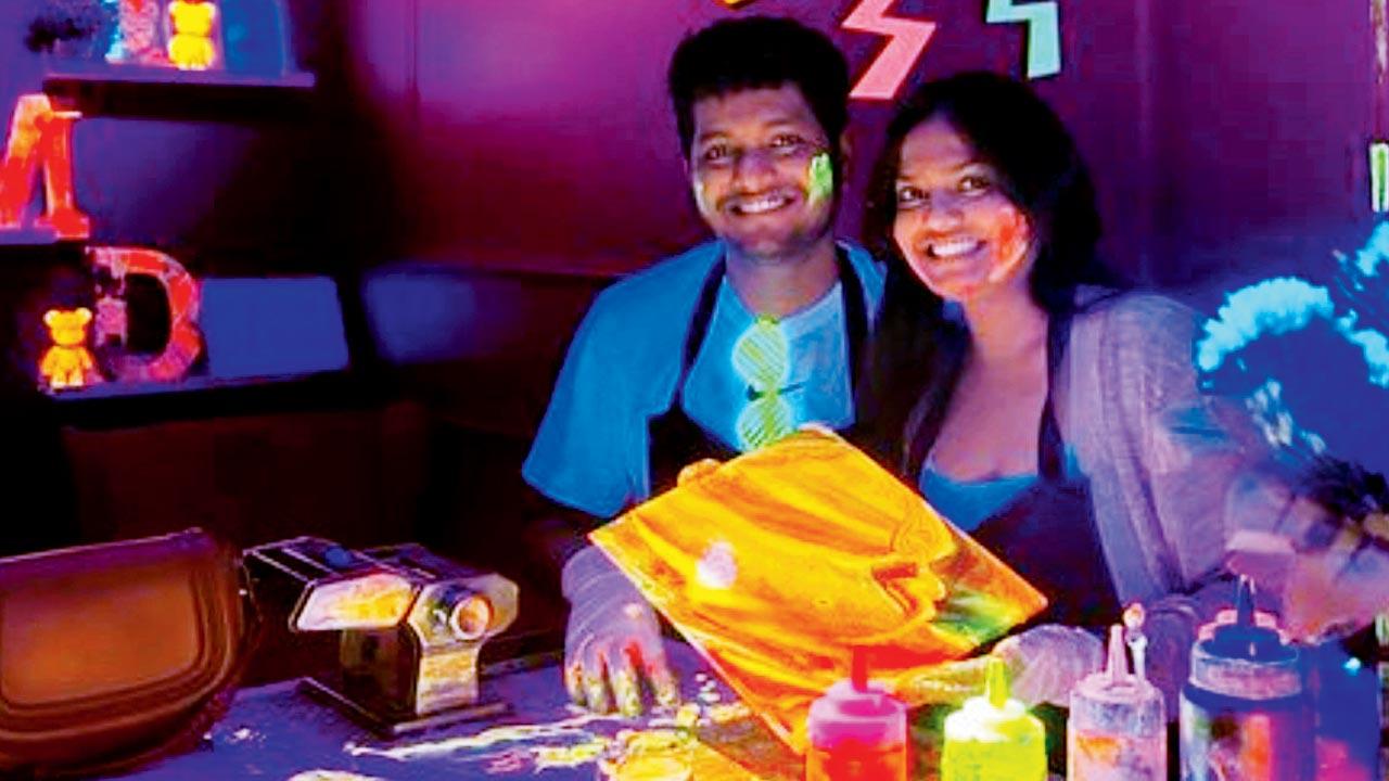 Participants enjoy dabbling around with neon colours at an event