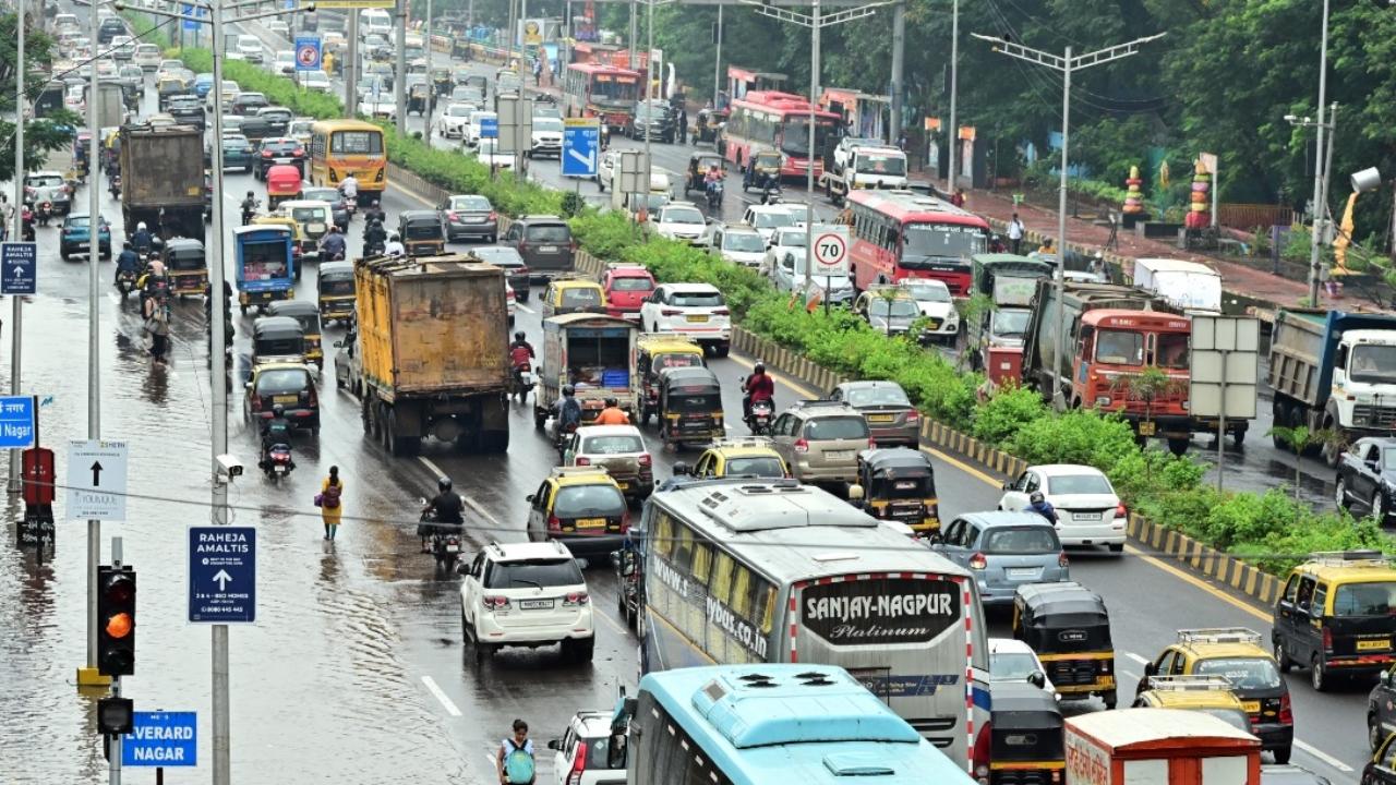 The torrential rains have disrupted suburban train services and caused severe waterlogging in multiple areas, resulting in stagnant traffic
