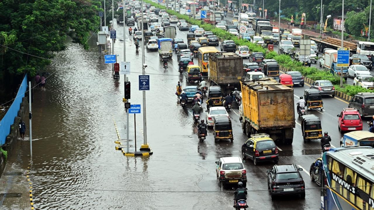 Heavy rainfall causes traffic jams on Eastern Express Highway in Mumbai