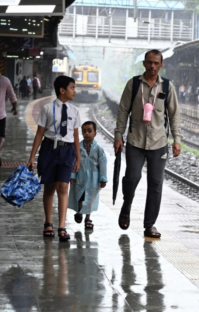 Central and harbour line trains were running late due to heavy rains on Thursday
