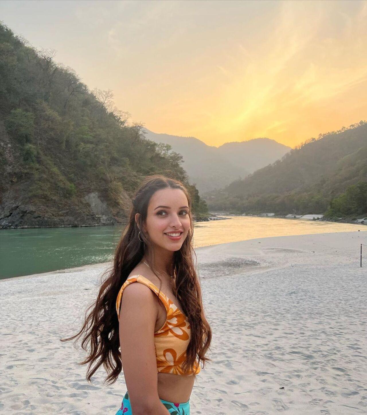 Triptii even tried to match the sunset hues through her outfit as she smiled for the camera. 
