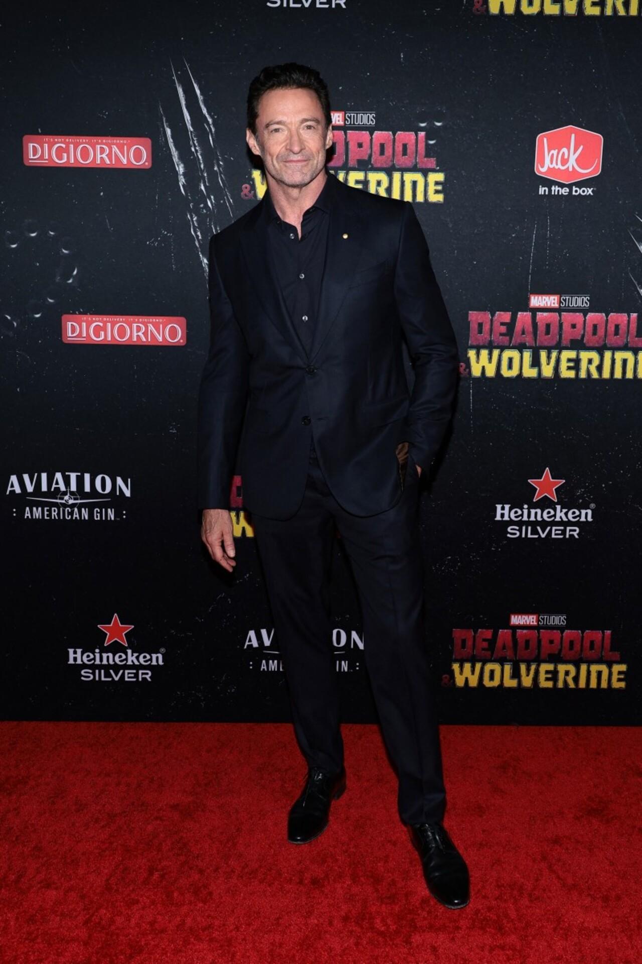 Australian actor Hugh Jackman, who has been playing Wolverine for decades was all smiles in an all black suit. 