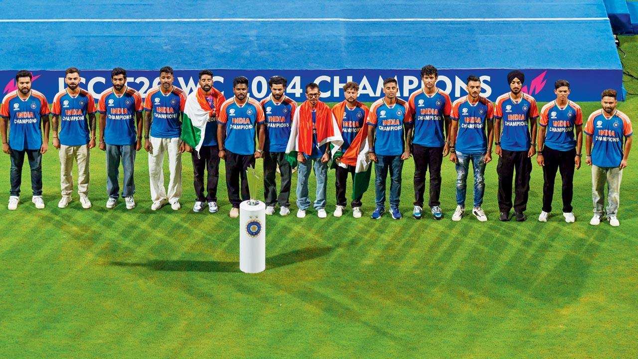 India’s  T20 World Cup champion team line up at the Wankhede yesterday. Pic/Getty Images
