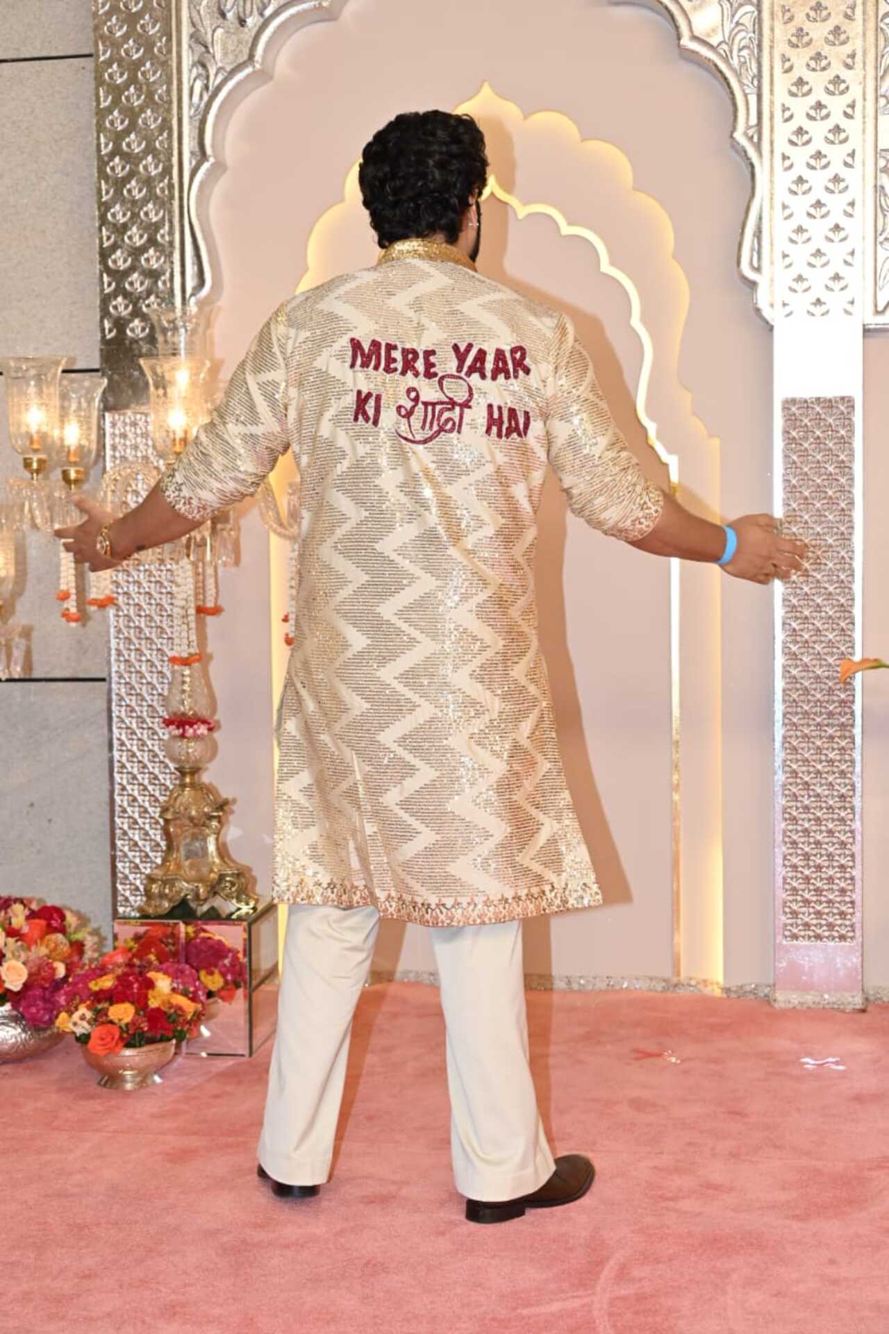 The back of Arjun's kurta reads: 'Mere yaar ki shaadi hai'