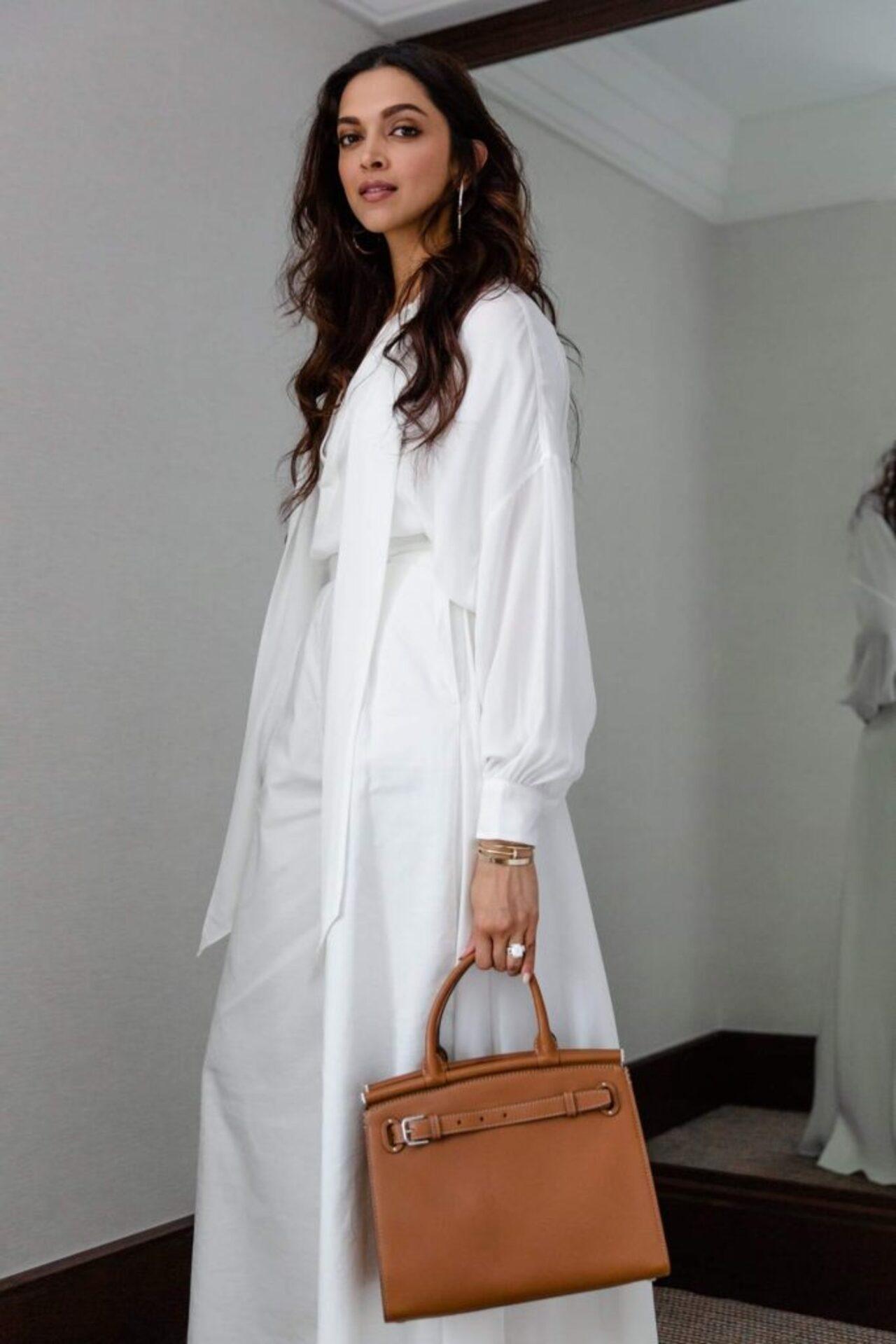 Bollywood actress Deepika Padukone has a keen interest in sports , especially tennis and badminton. The actress sported a classy all-white look when she attended the Wimbeldon with her athlete sister Anisha Padukone