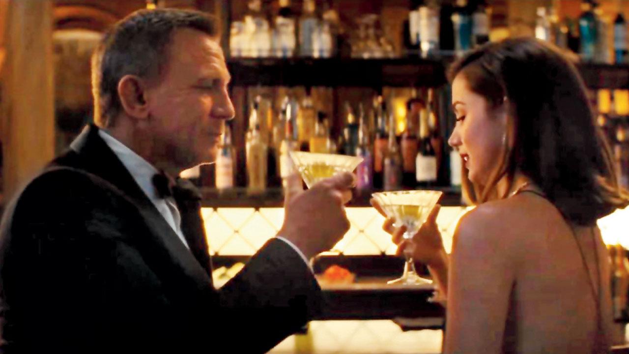 Daniel Craig’s James Bond tries his trademark martini in the film, No Time to Die (2021). Pic Courtesy/Youtube