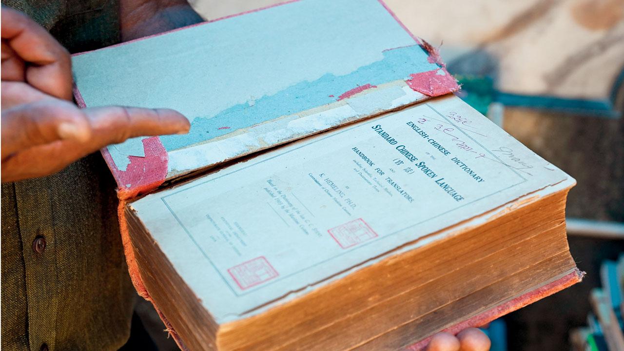 Nadar shows a Chinese translated book that was published in 1935