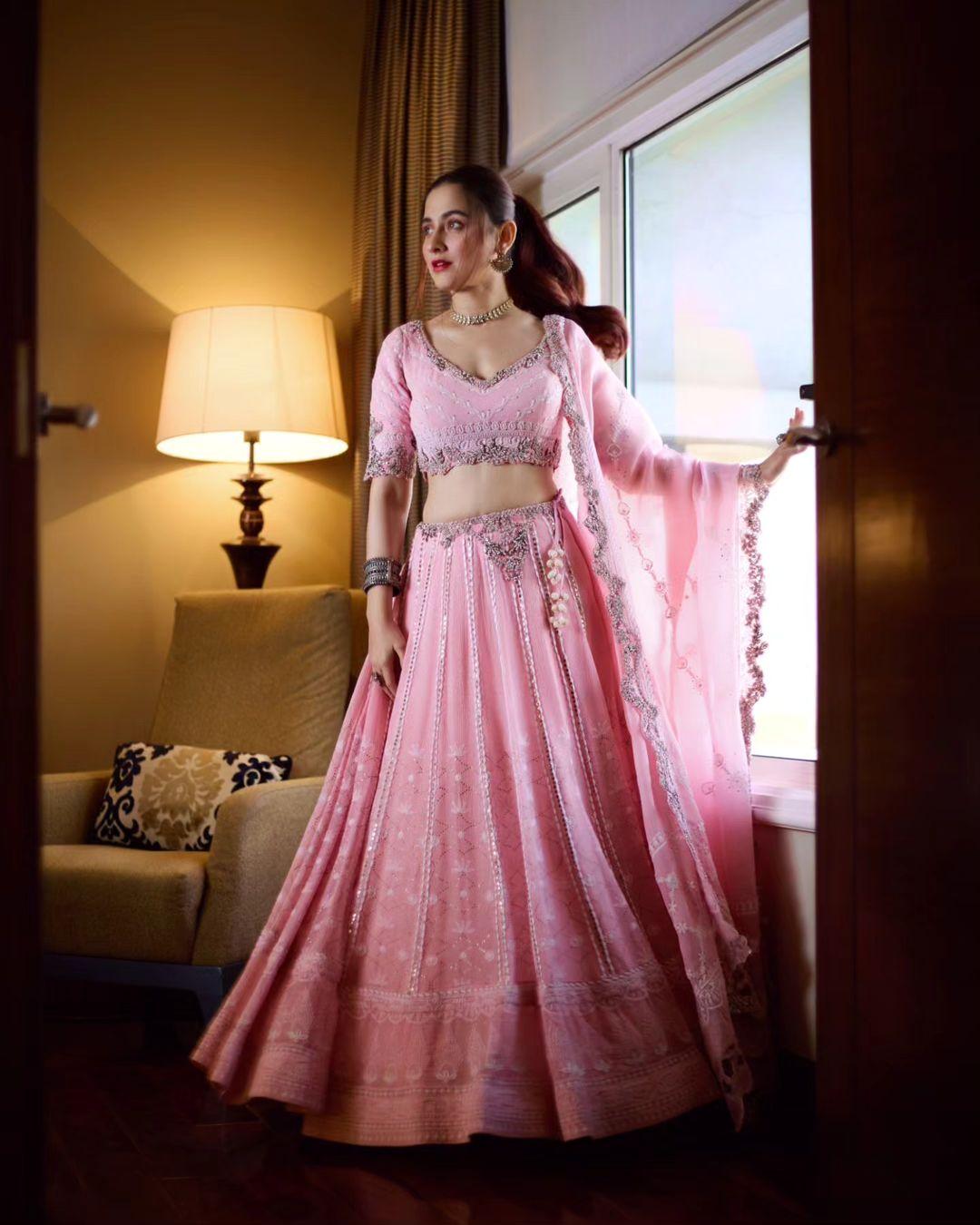 The beautiful lehenga flared out to fully put on the display of the ensemble