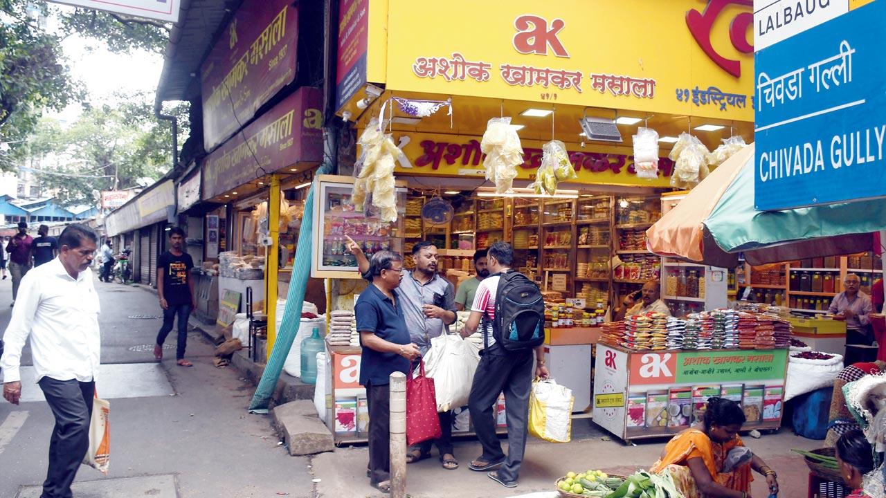 Customers shop for spices at Ashok Khamkar’s store near Chivda Gully in Lalbaug. File pics 