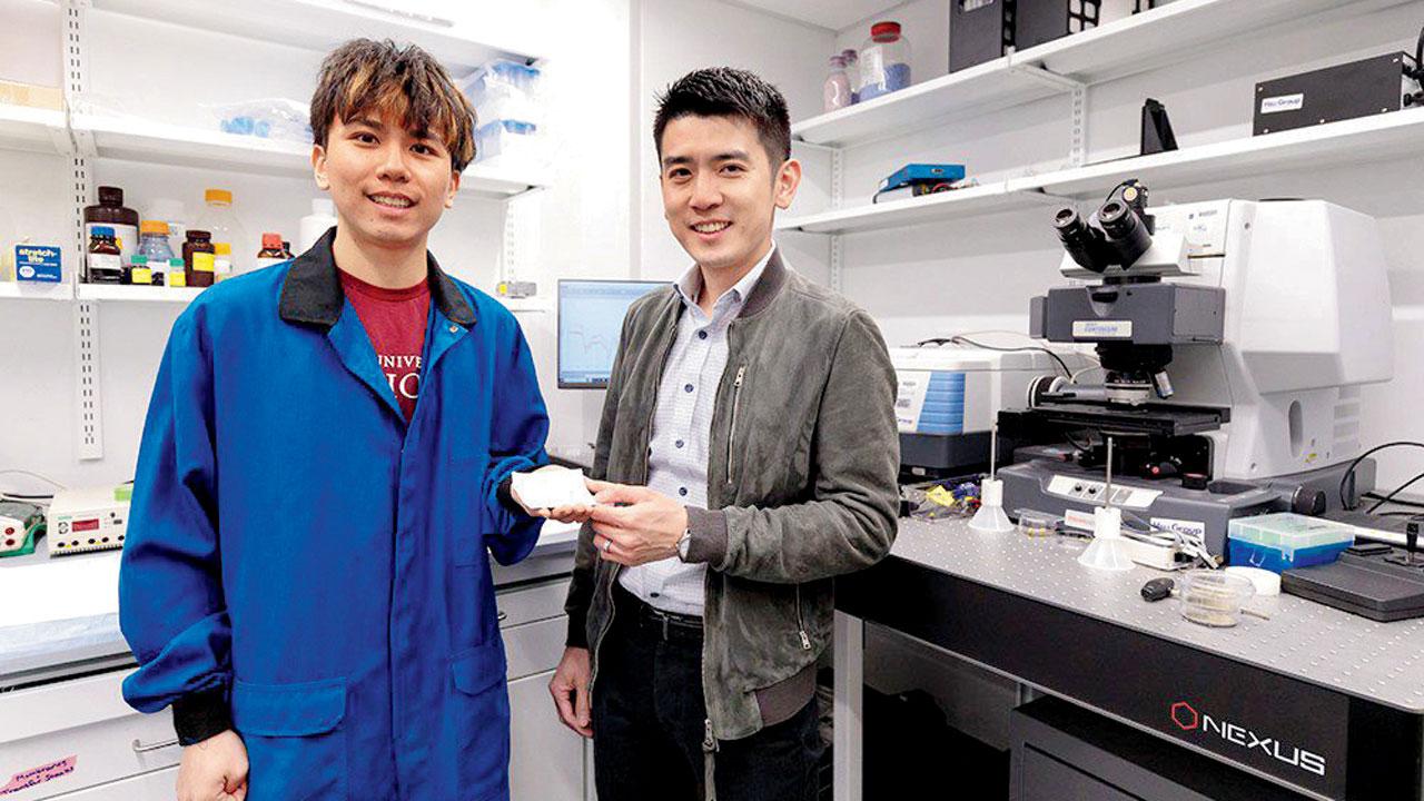 UChicago Pritzker School of Molecular Engineering PhD candidate Chenxi Sui (left) and Asst Prof Po-Chun Hsu show off a sample of a new cooling textile. PIC/JOHN ZICH