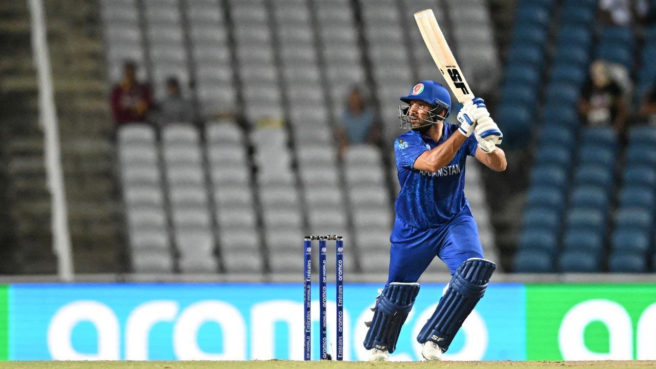 Afghanistan beat PNG to advance at T20 World Cup as NZ eliminated