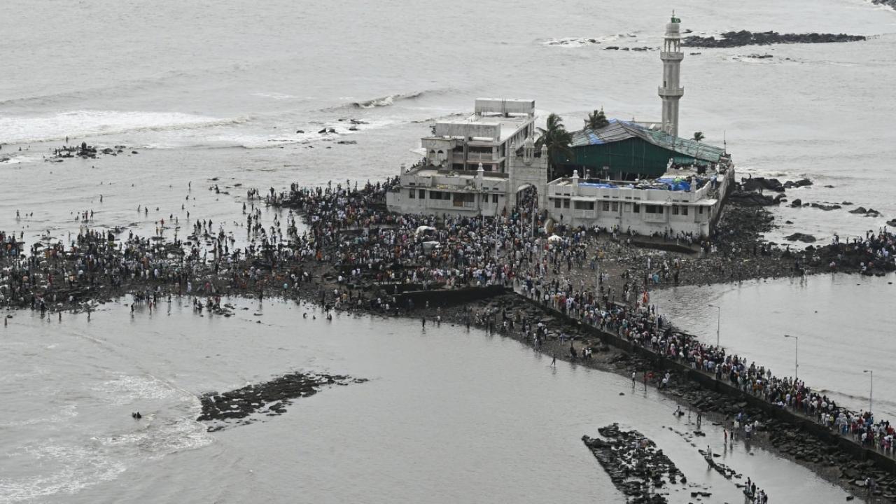 The Haji Ali Dargah was built in the name of Pir Haji Ali Shah Bukhari and it is located on an islet off the coast of Worli in south Mumbai.
