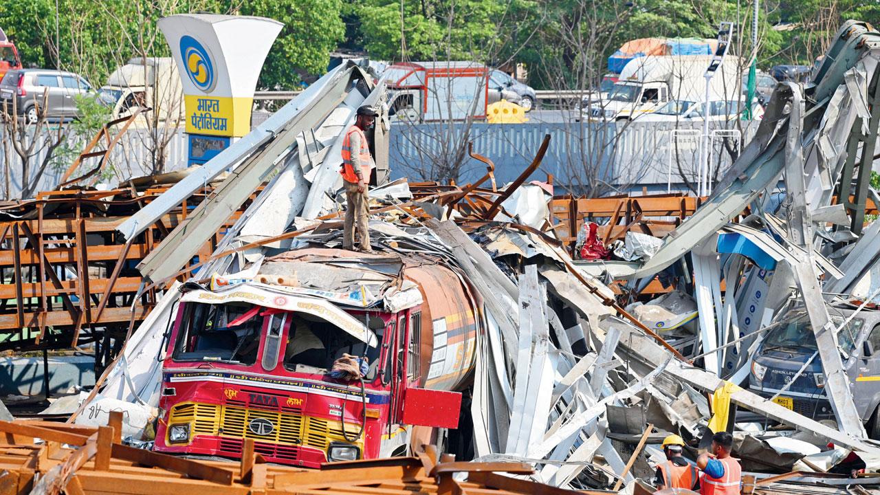 BMC and fire brigade clearing the debris. File Pic/Atul Kamble
