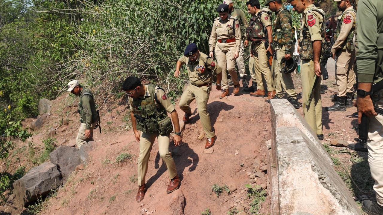 In order to get detailed information, additional Director General of Police (ADGP), Jammu Zone, Anand Jain along with security personnel visited the spot of attack. Pic/PTI