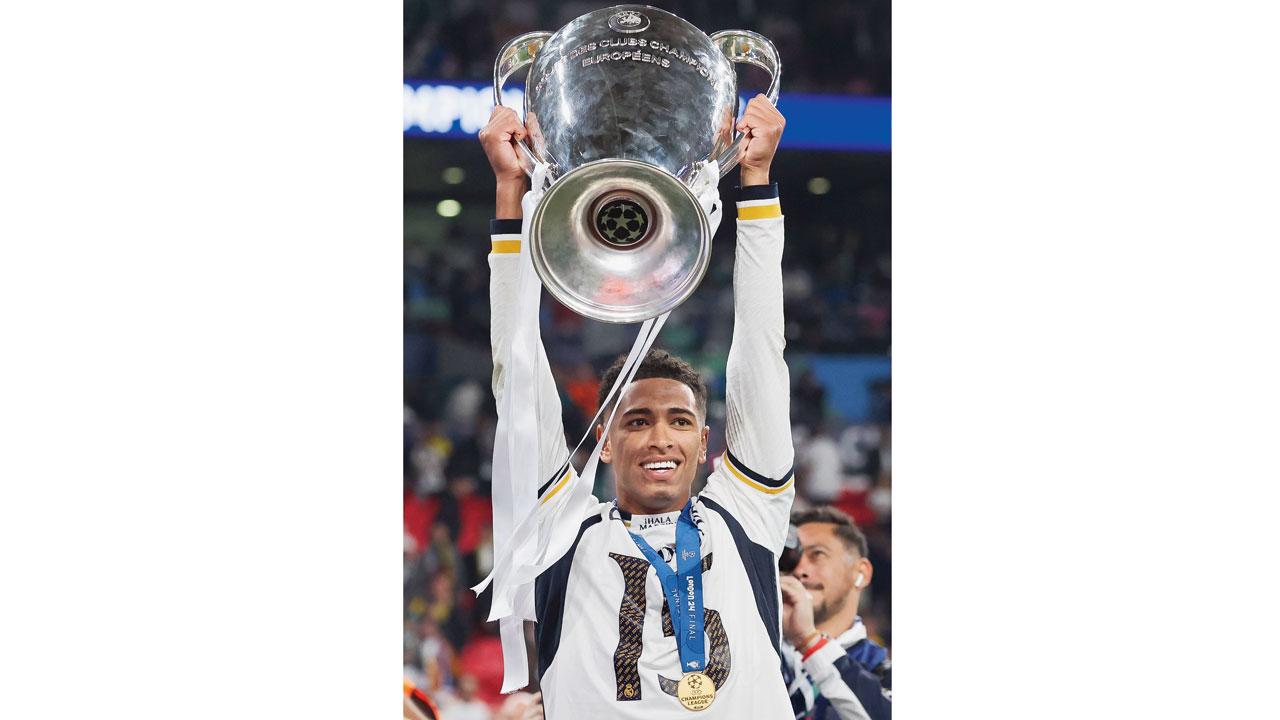 Jude Bellingham with the Champions League trophy on Saturday. Pic/Getty Images