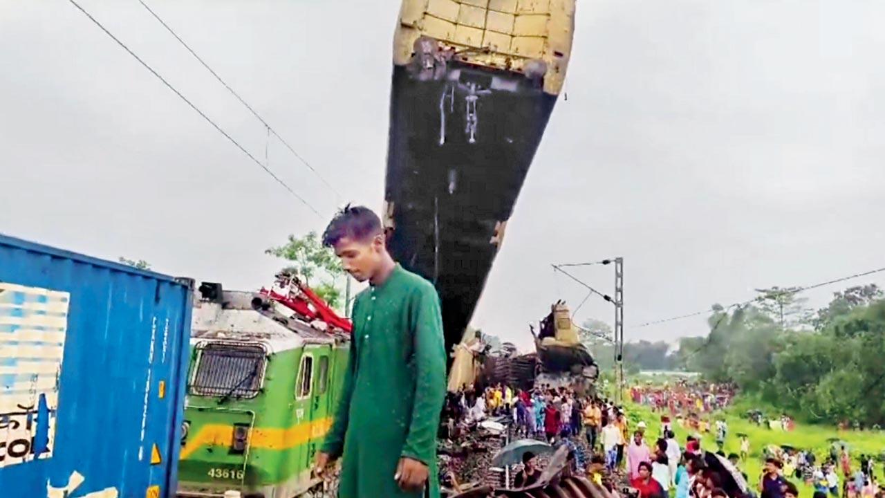 People gather near the site of a collision. Pics/PTI