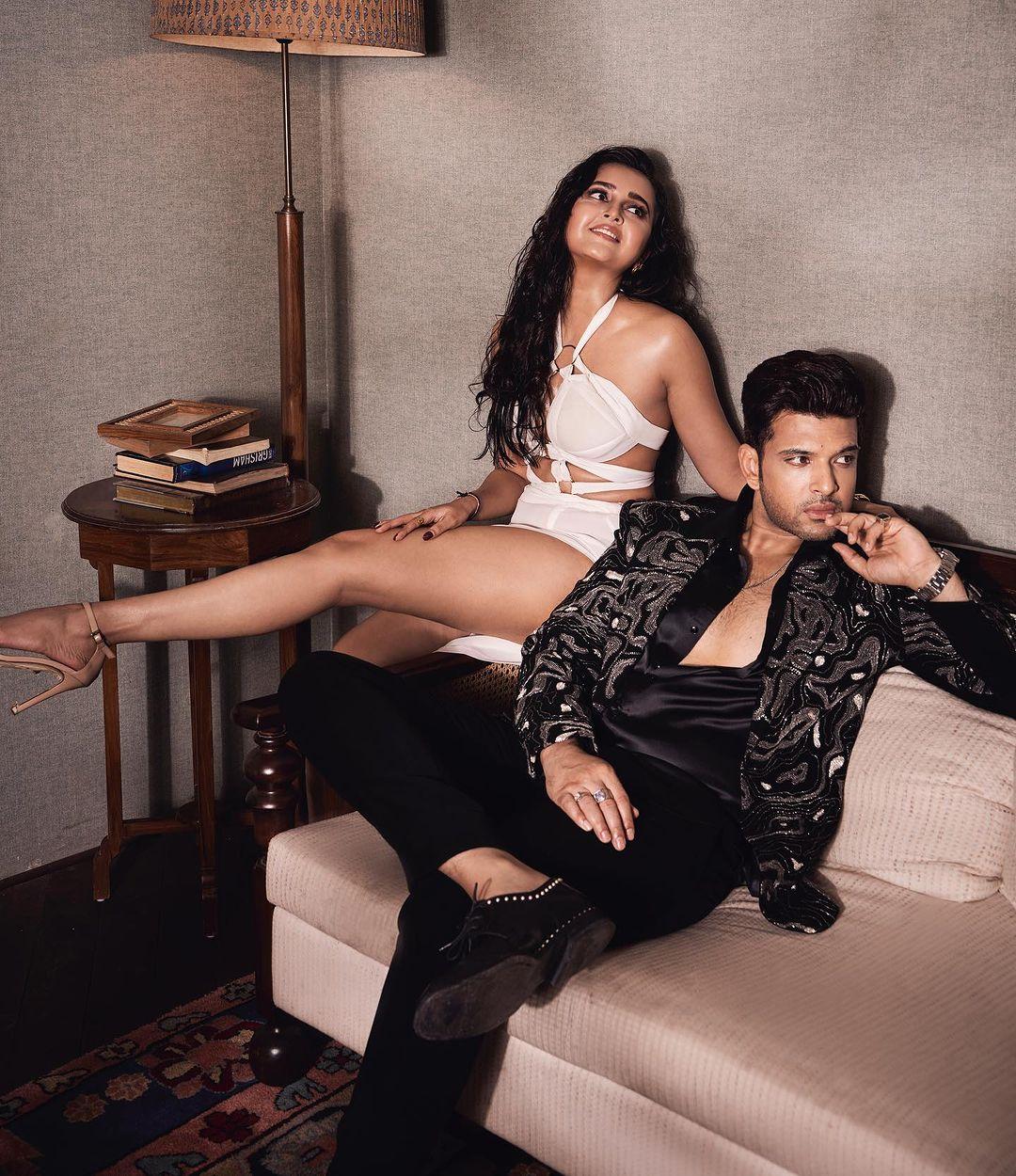 Tejasswi opted for a white mini dress while Karan looked extremely handsome in an all-black suit
