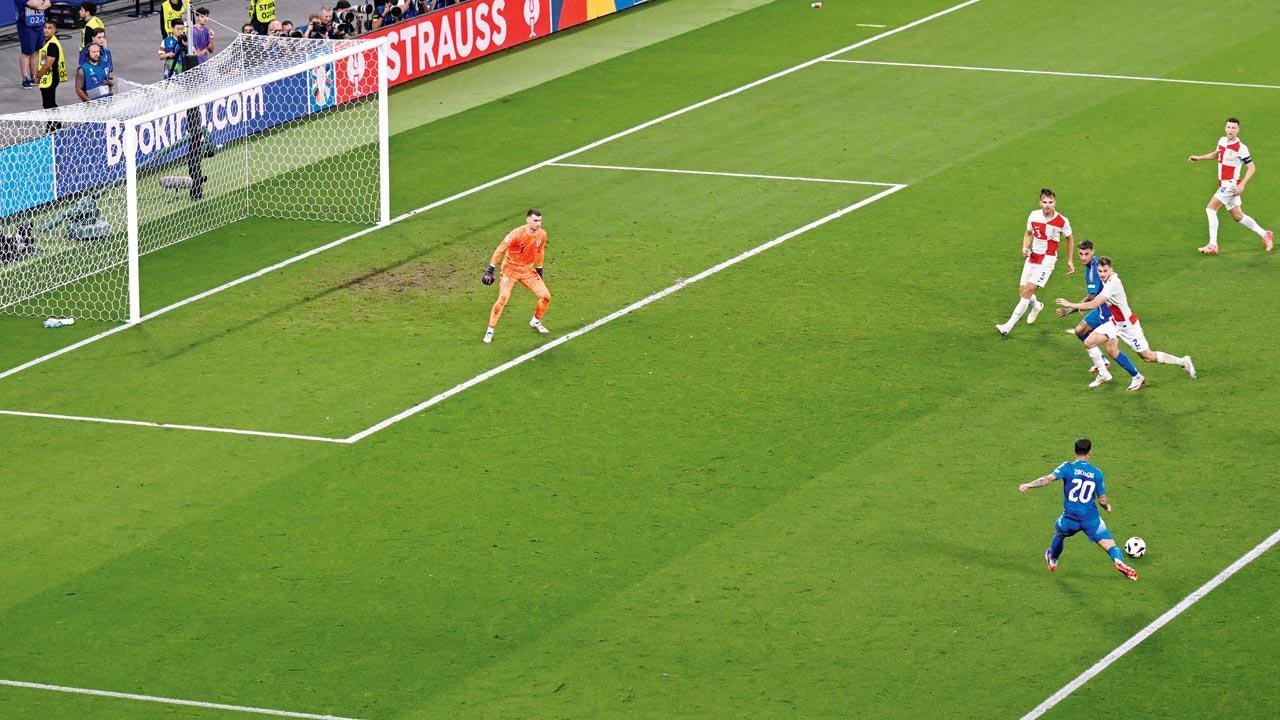Italy’s Mattia Zaccagni scores the equaliser against Croatia in Leipzig, Germany, on Monday