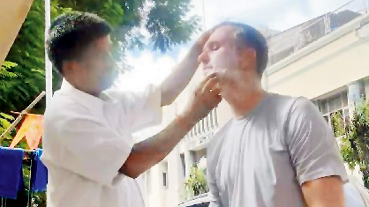SoBo barber Dindayal Sharma says British cricketer Michael Vaughan has been going to him for haircuts and shaves for two years. PIC/ASHISH RAJE