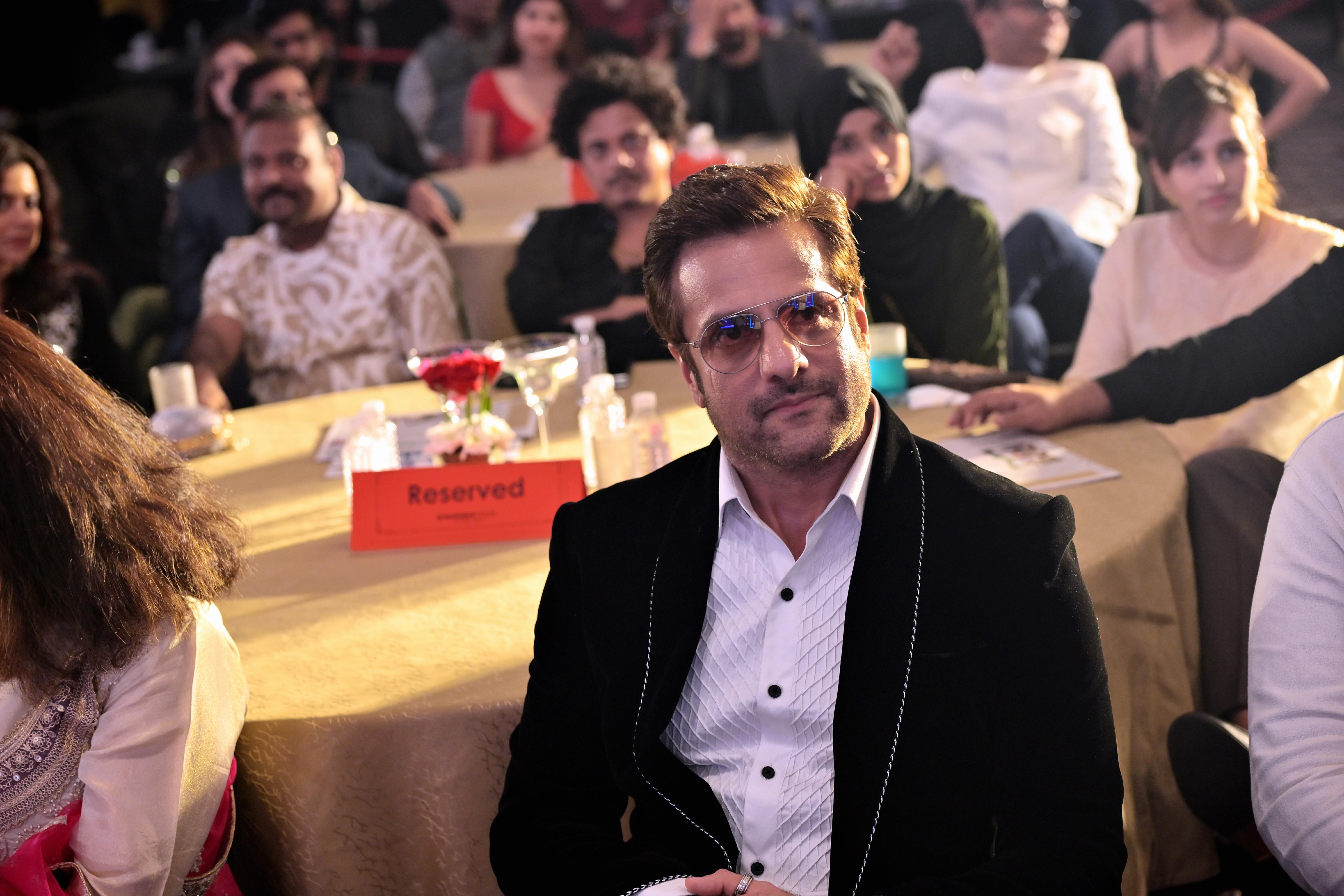 Fardeen looked super handsome in a black suit paired with matching pants